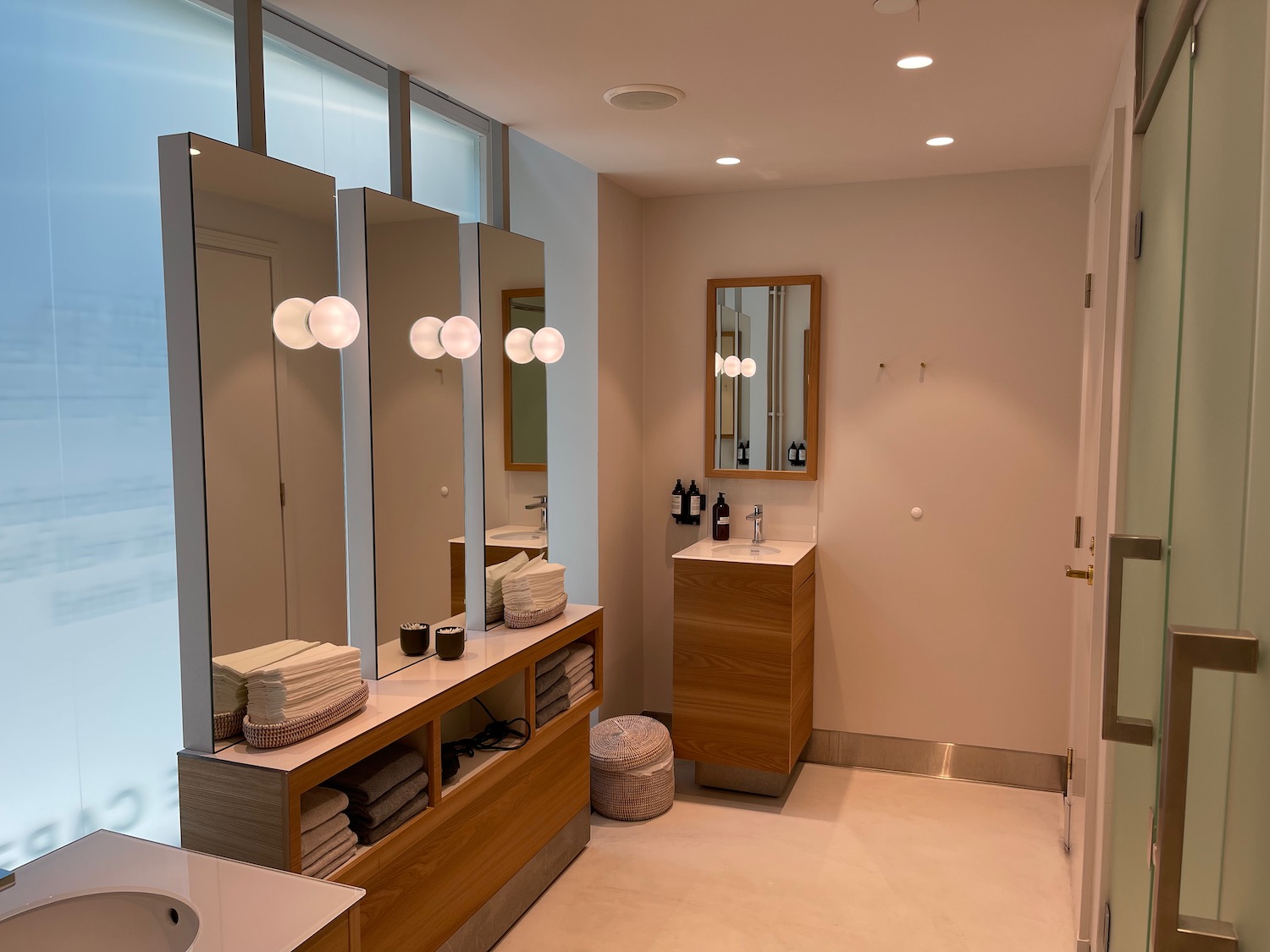 a bathroom with a mirror and sink