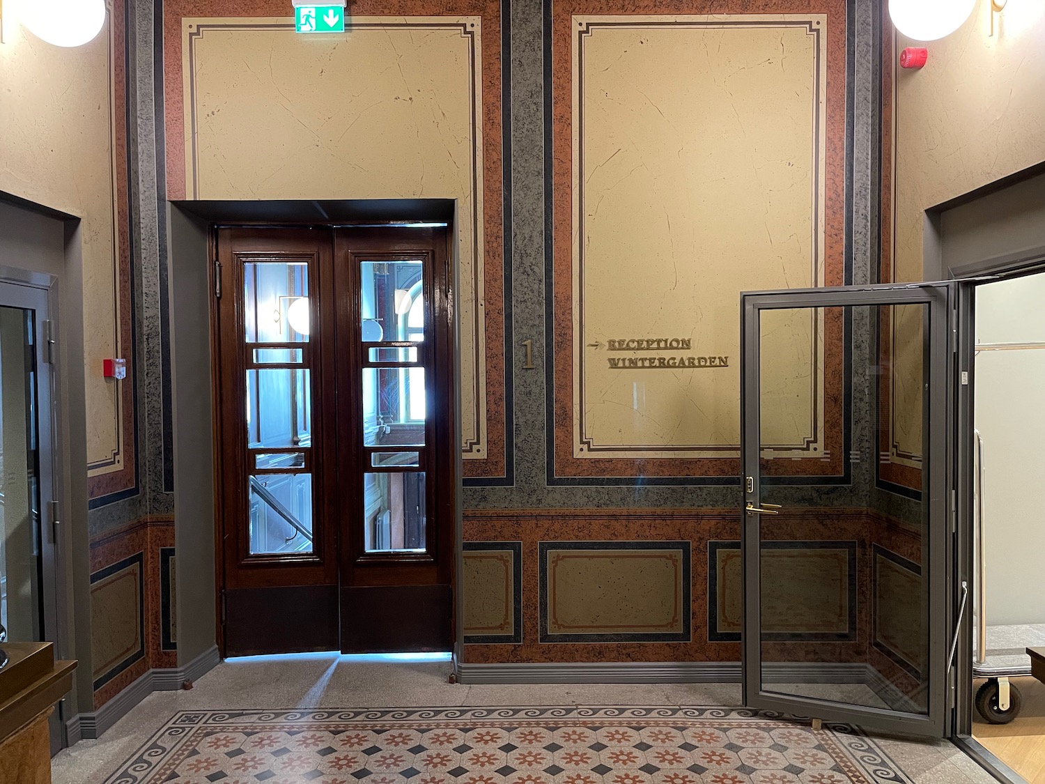 a door and glass door in a building