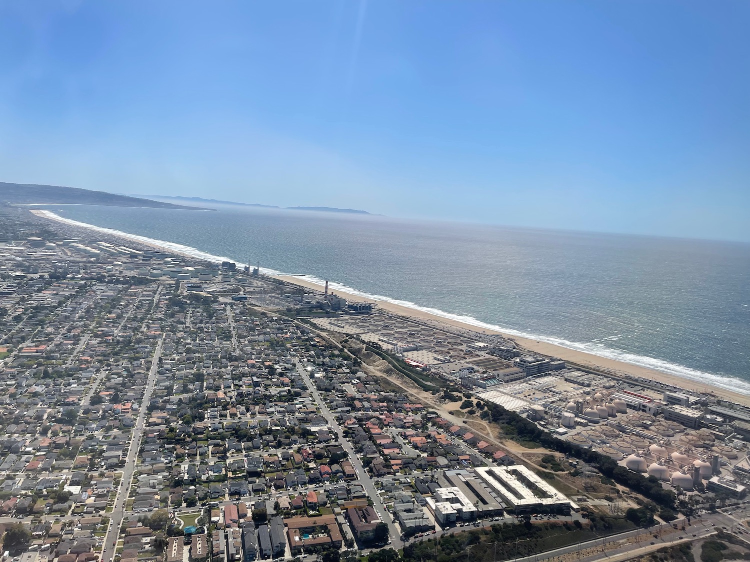 aerial view of a beach and a city