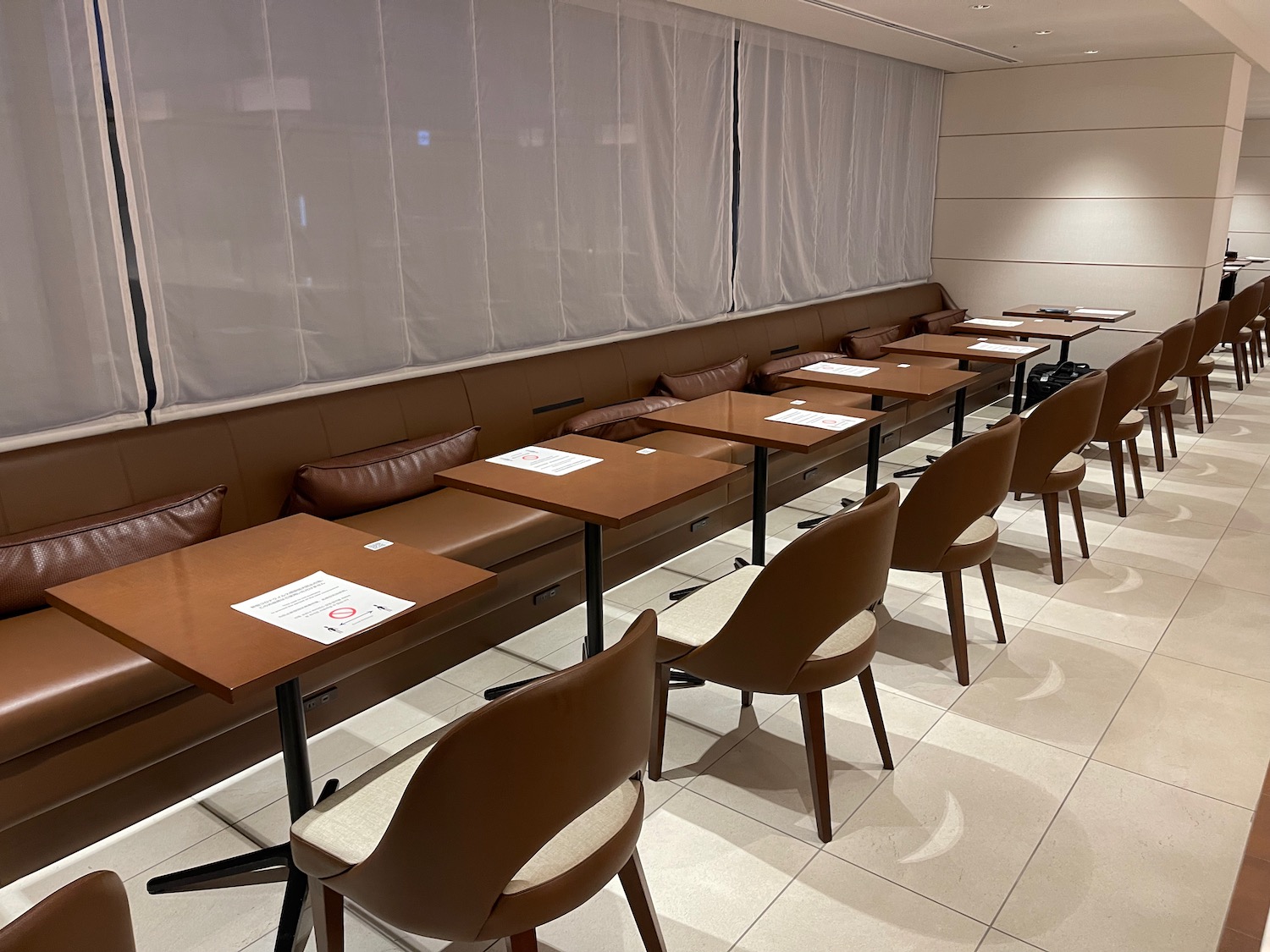 a long table with chairs in a room