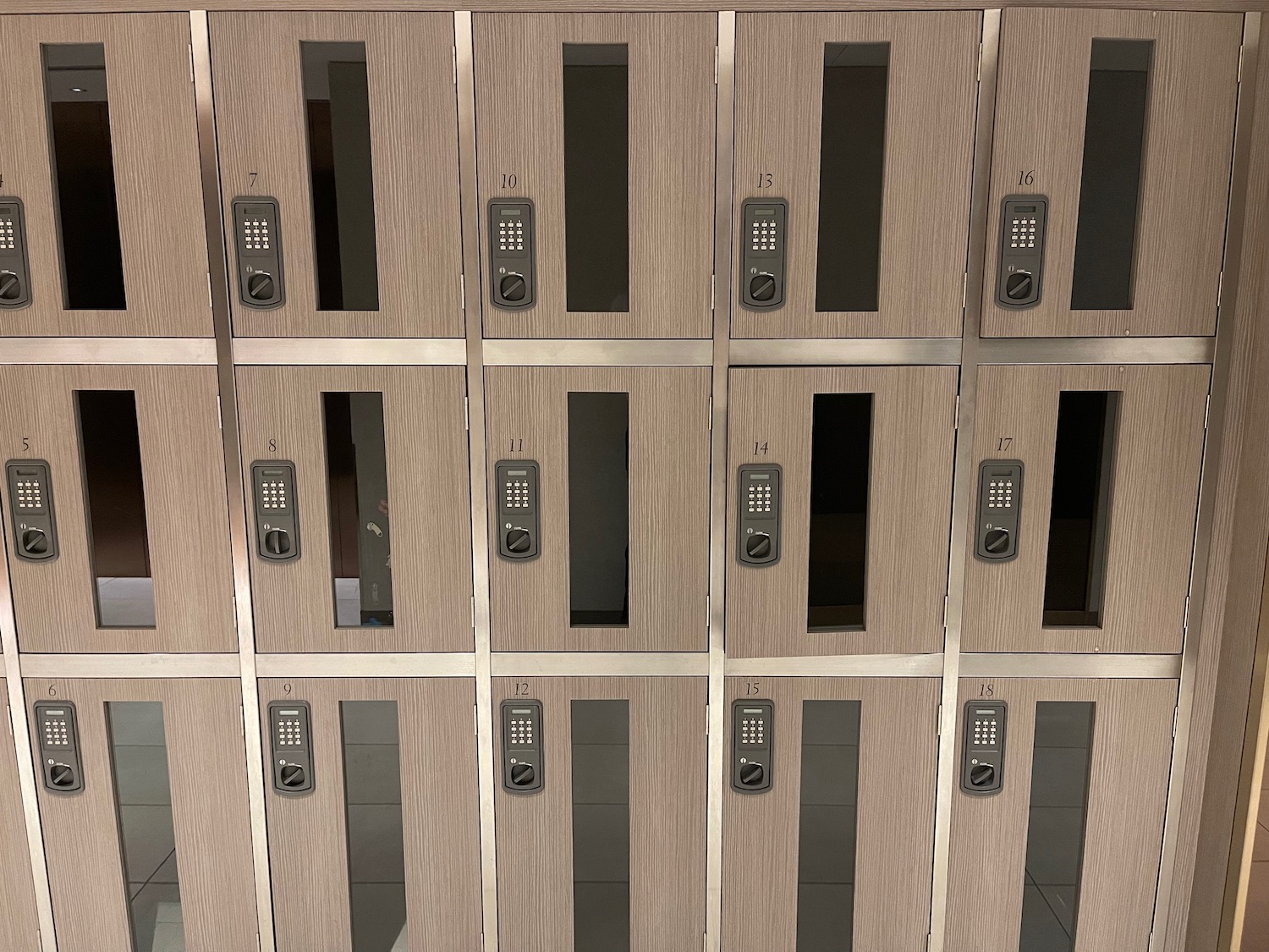 a group of lockers with buttons