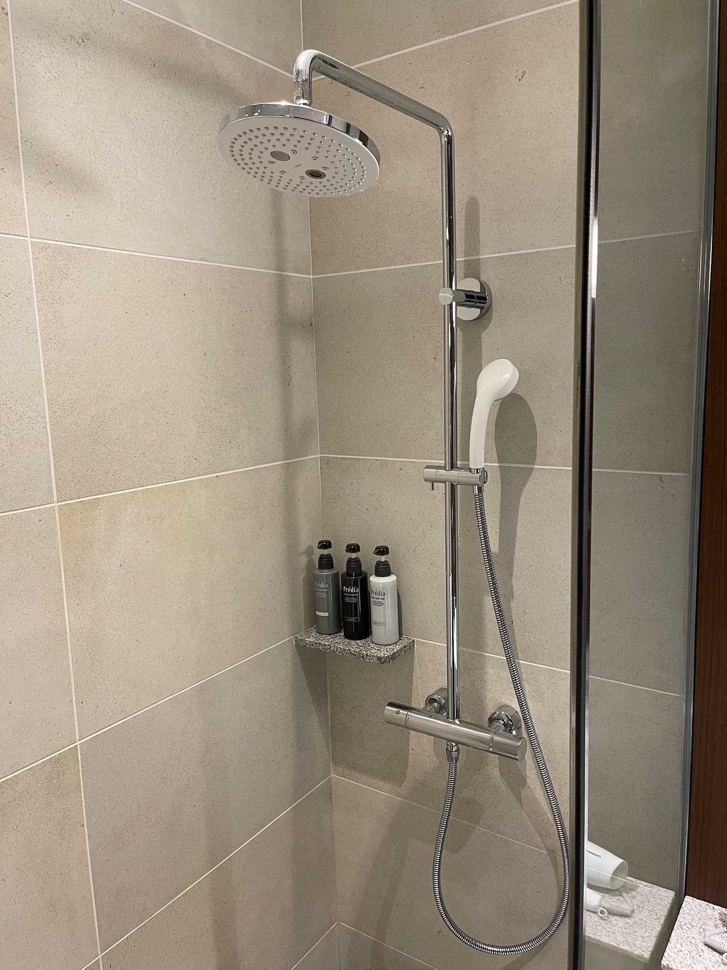 a shower with a shower head