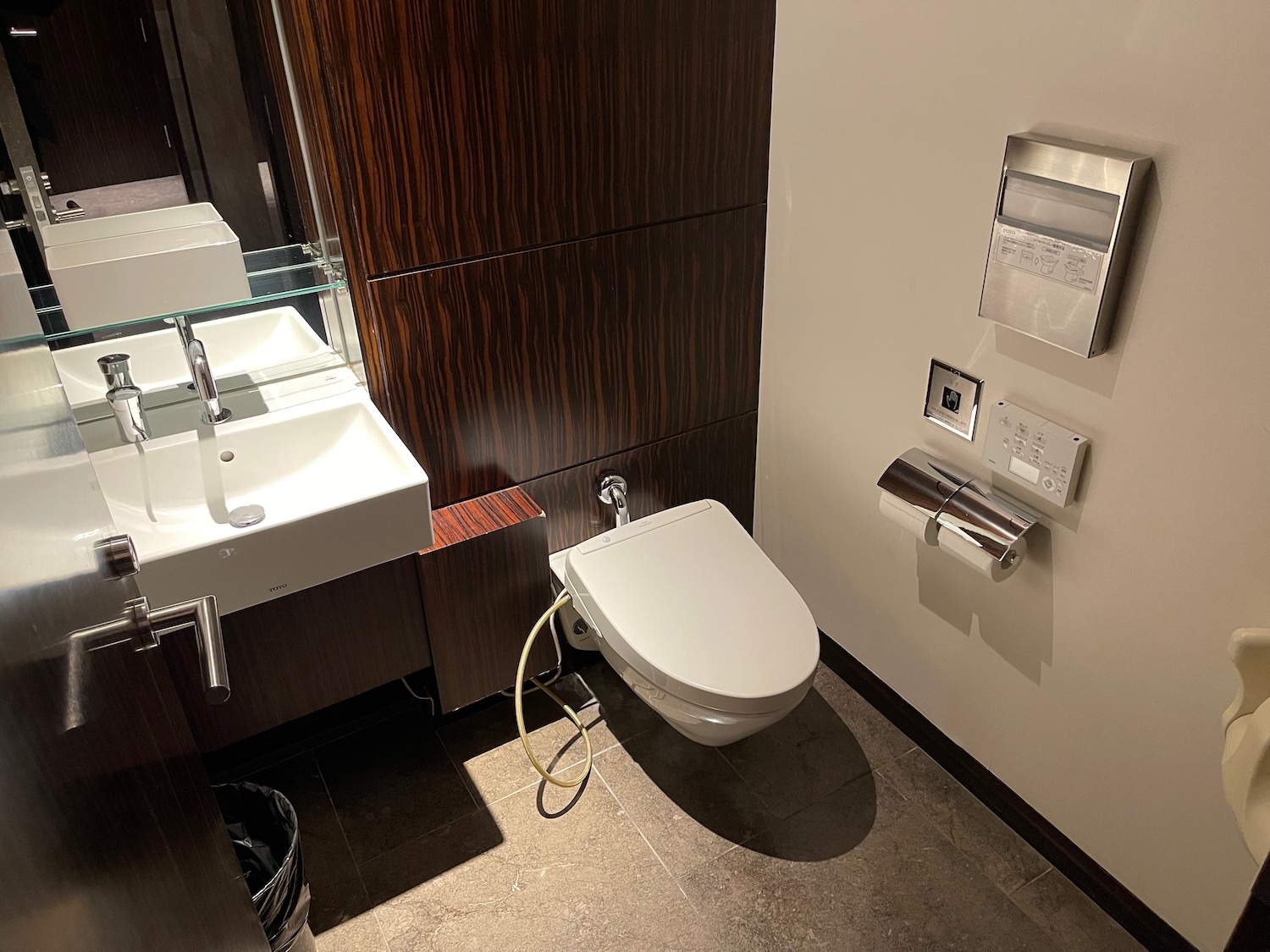 a toilet and sink in a bathroom