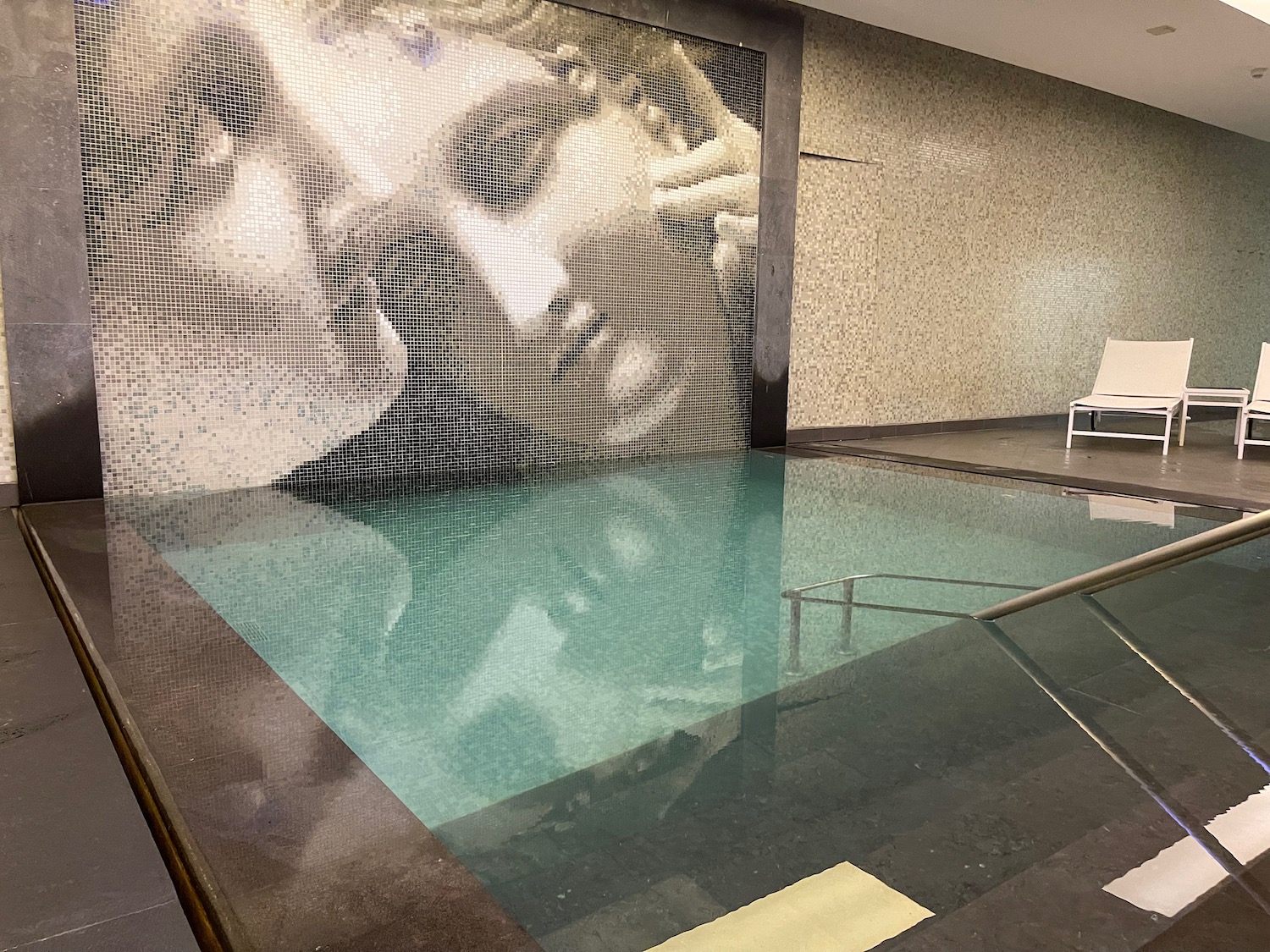 a pool with a picture of a woman's face