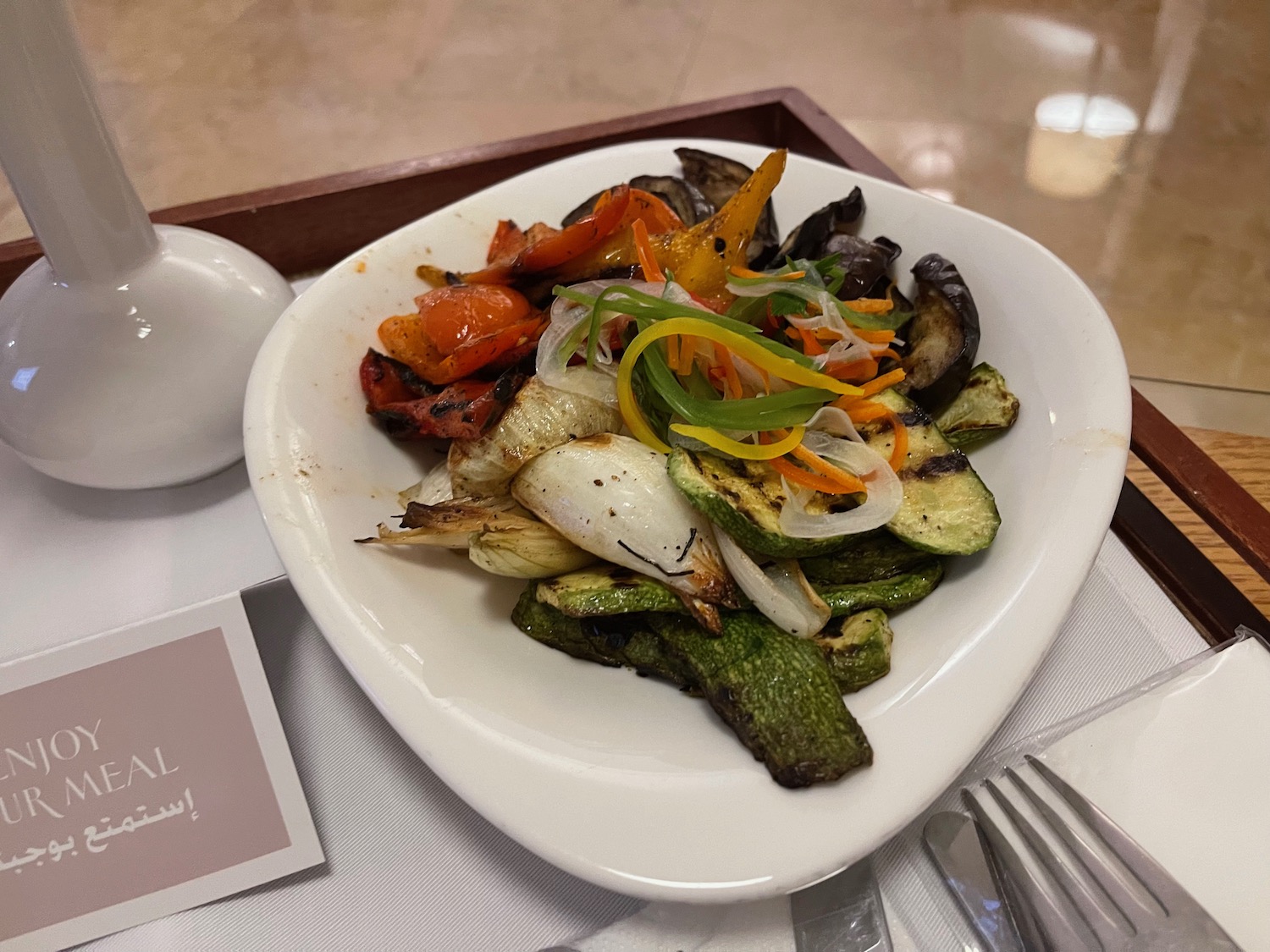 a plate of vegetables on a table