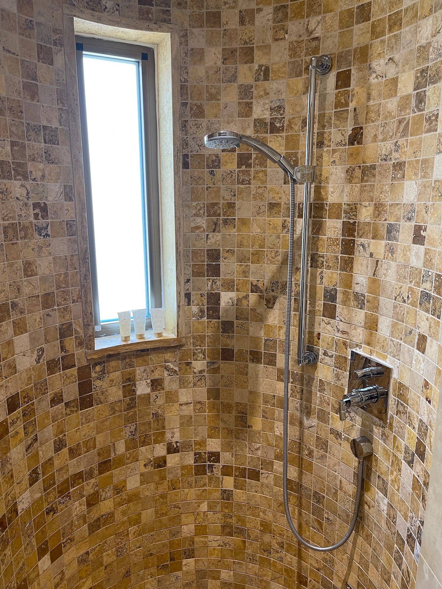 a shower with a shower head