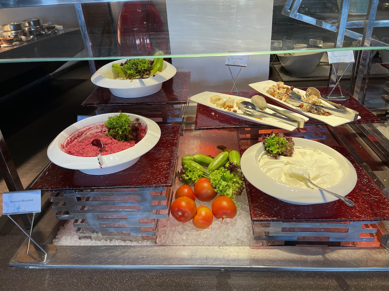 a buffet with different food items on it