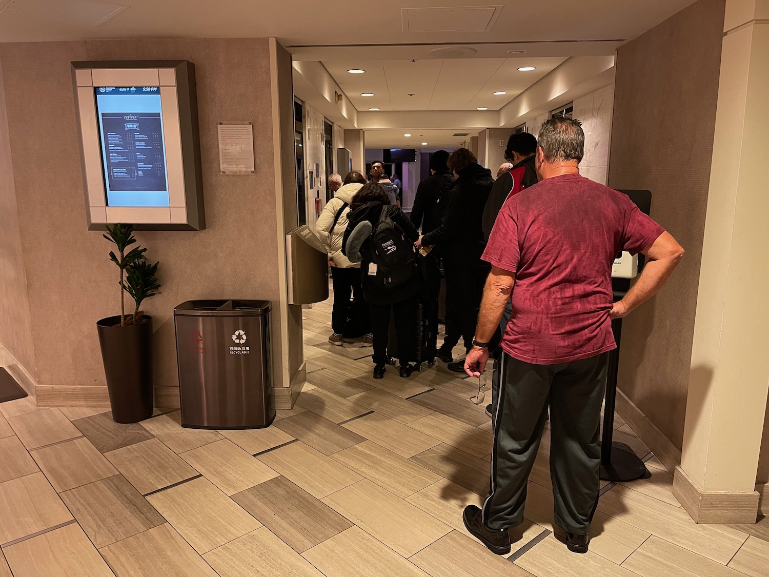 a man standing in a hallway