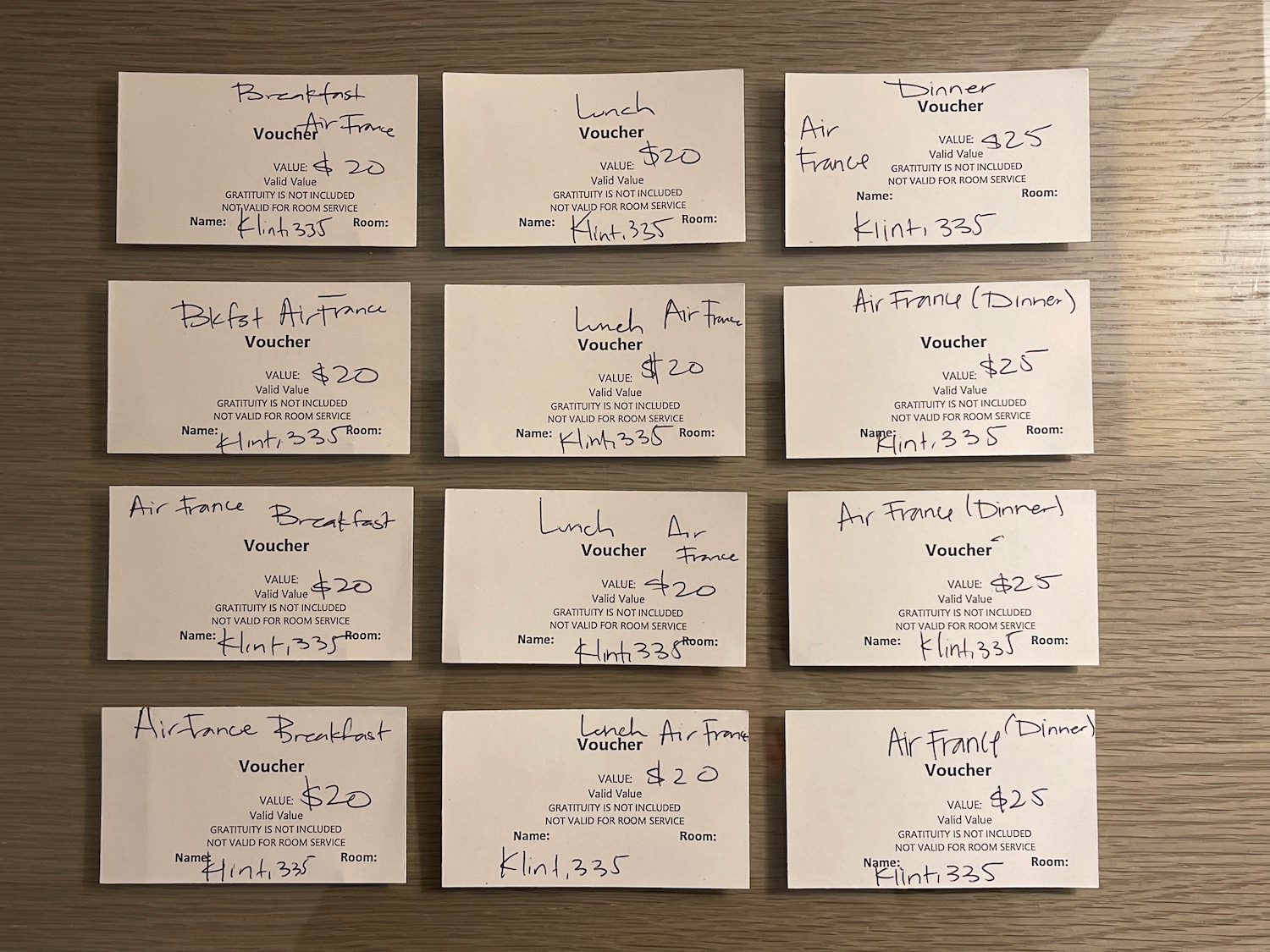 a group of white cards with black writing on them