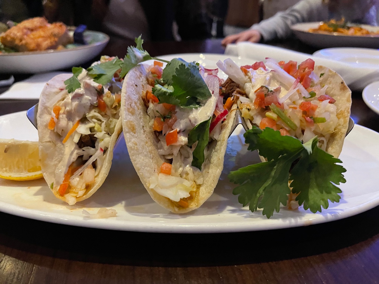 a plate of tacos on a table