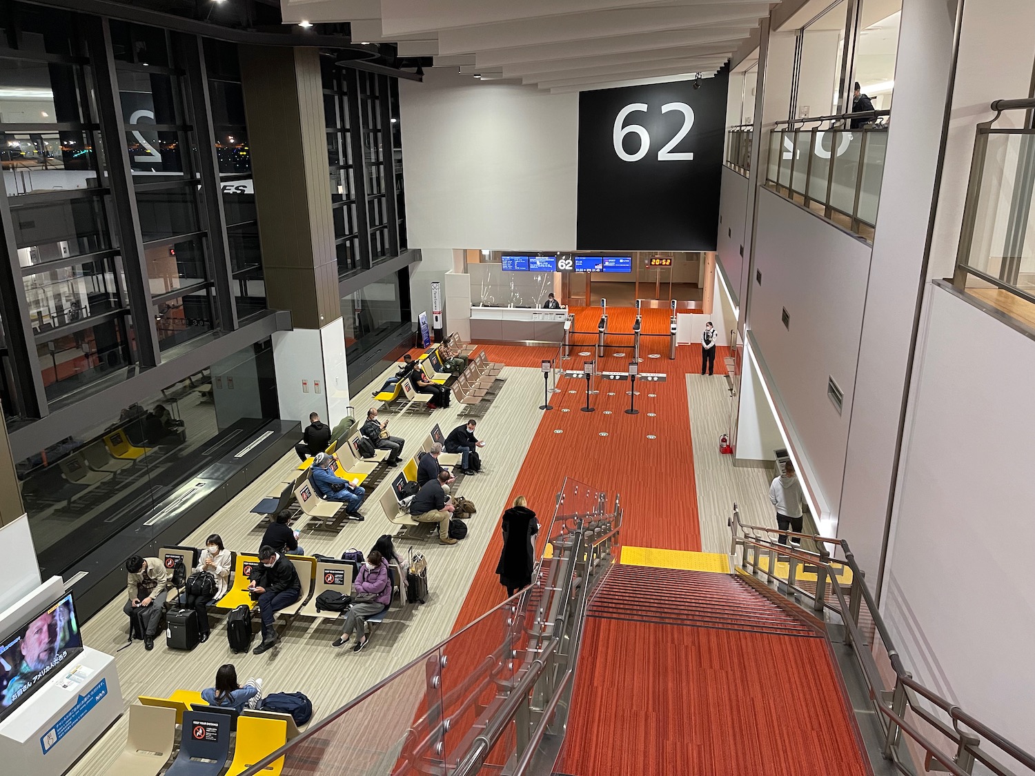 a group of people sitting in a terminal