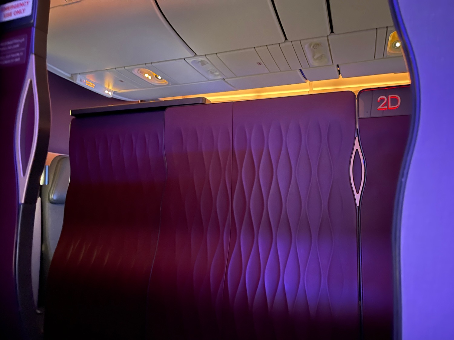 a purple seat on an airplane