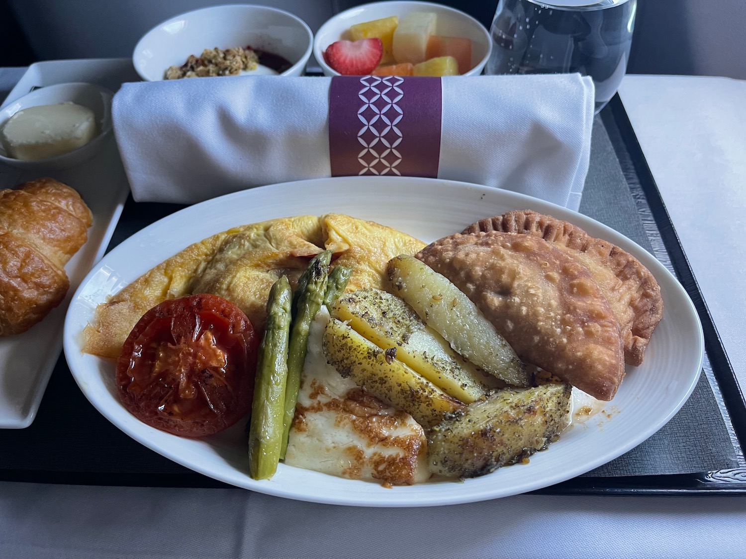 a plate of food on a tray