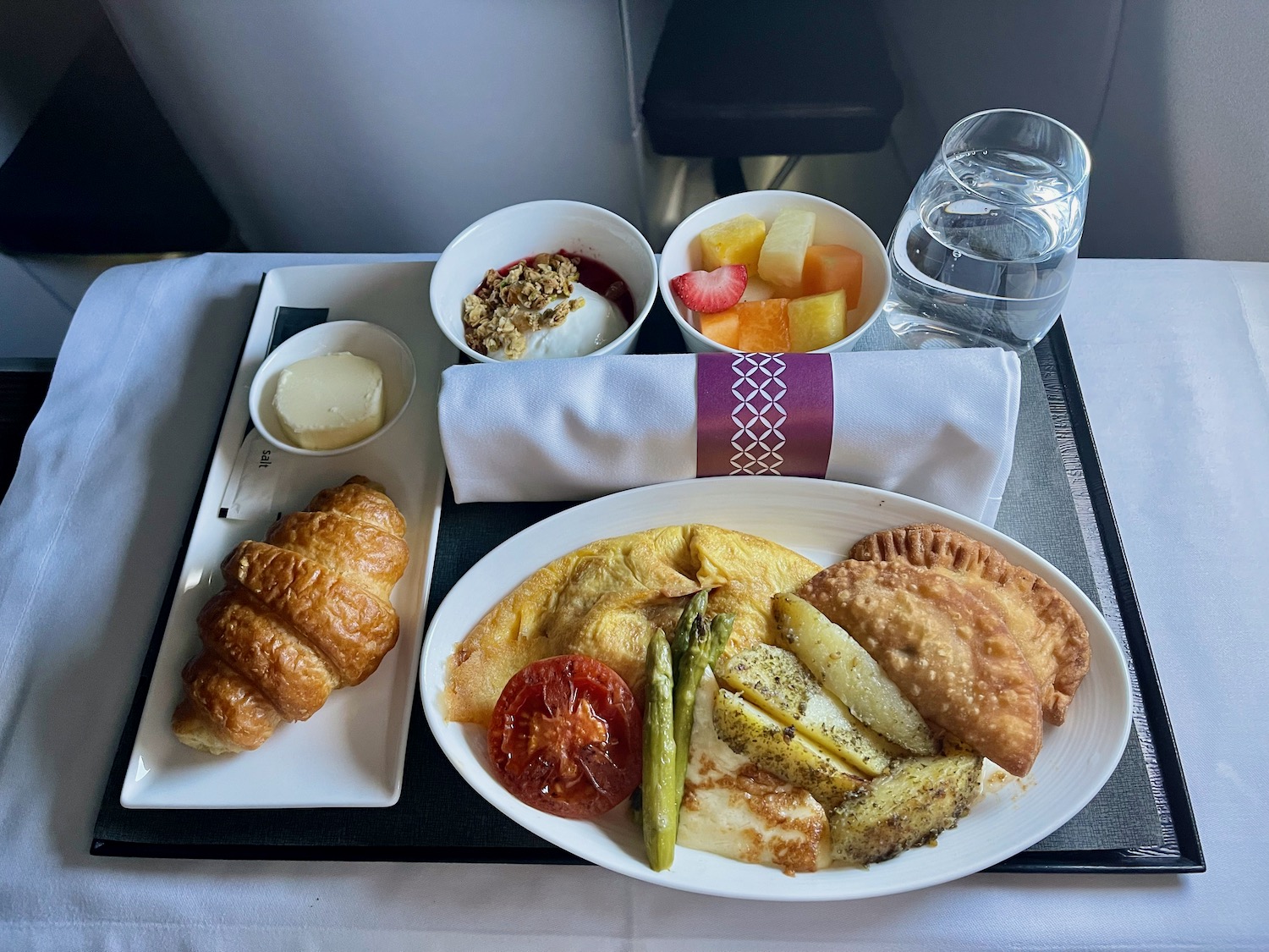 a plate of food on a tray