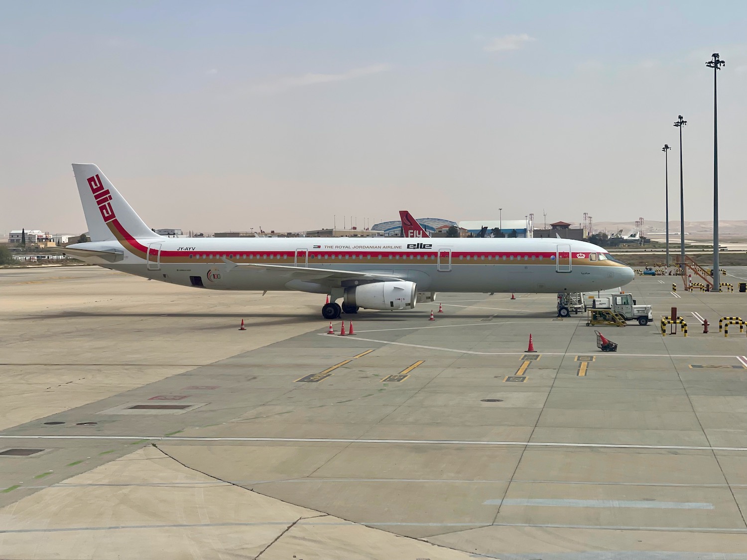 a white airplane on a runway