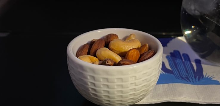 a bowl of nuts on a table