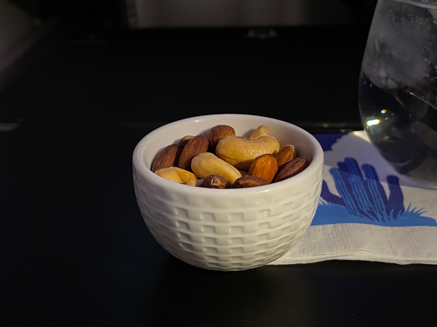 a bowl of nuts on a table