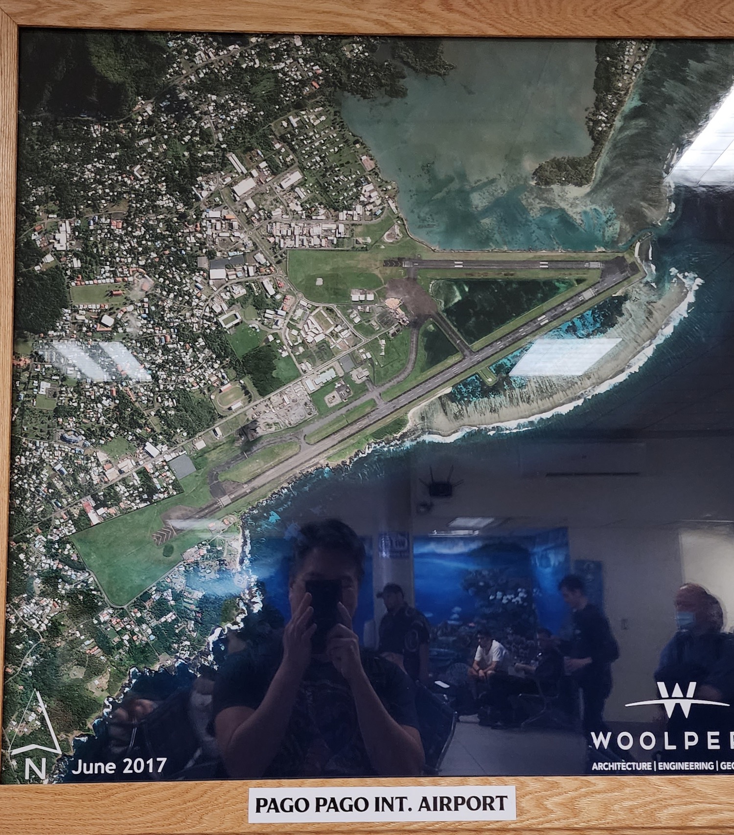 a person taking a picture of a map