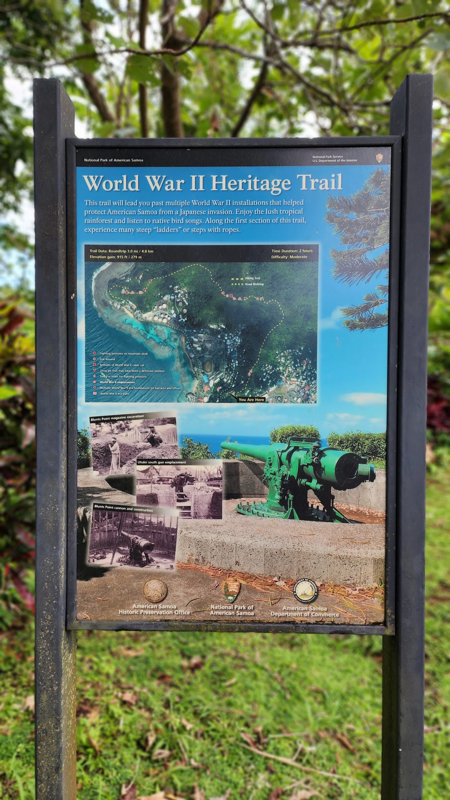 a sign with a picture of a cannon and a map