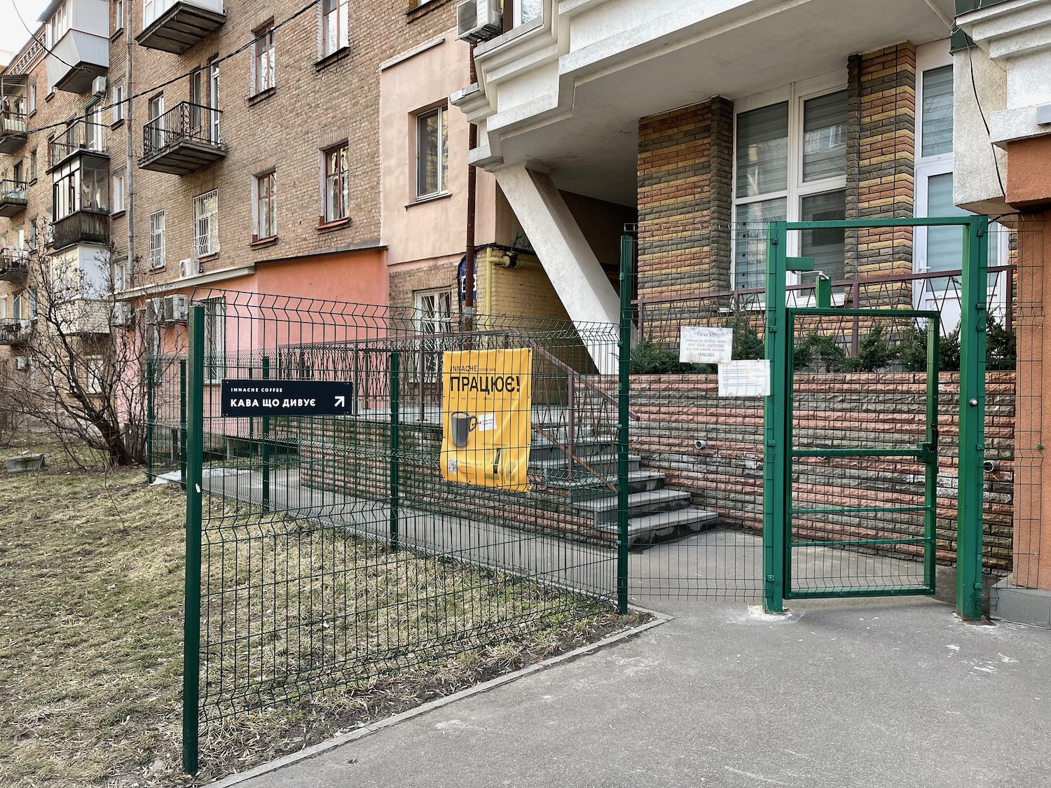 a fenced in area with a sign