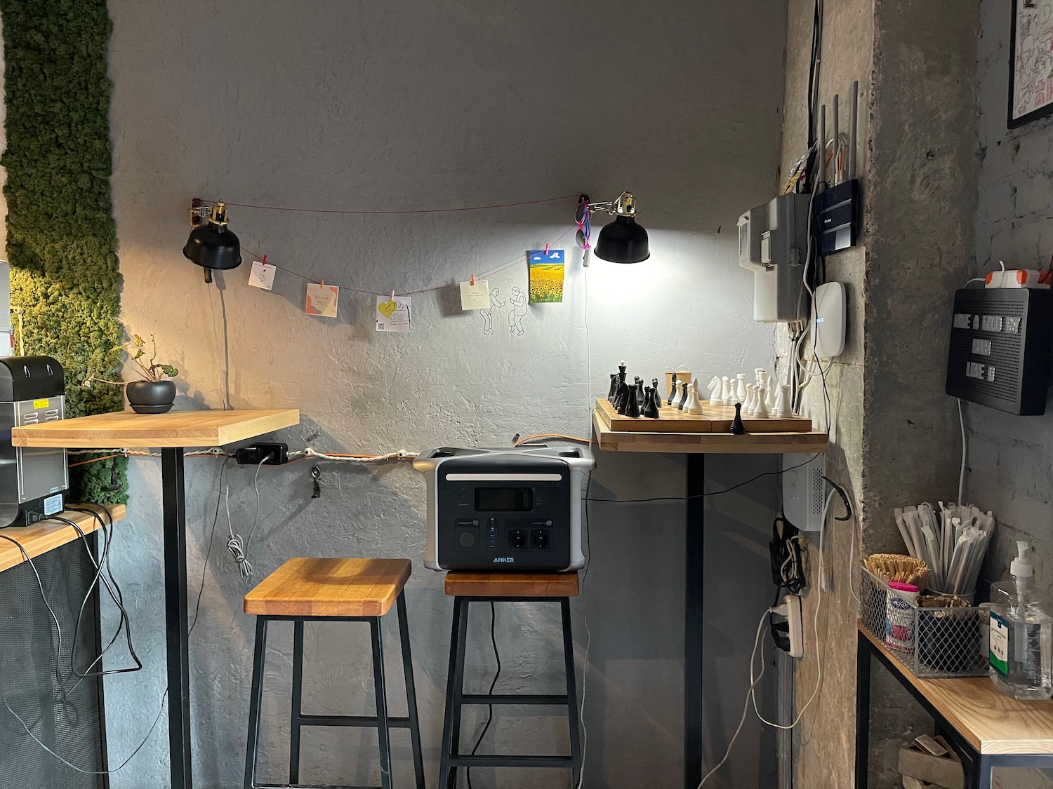 a table with stools and a speaker on it