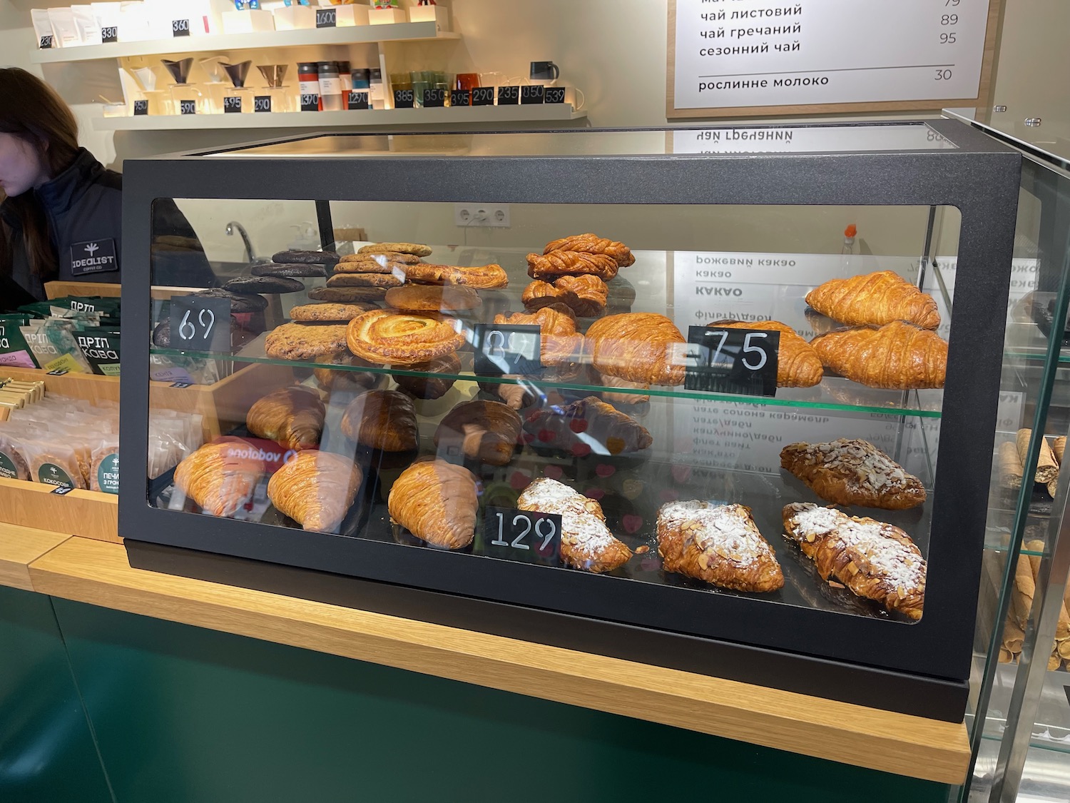 a display case with pastries and pastries