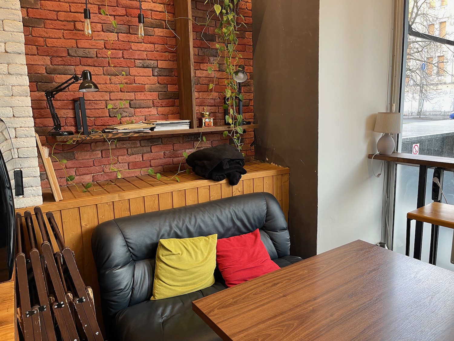 a room with a leather couch and a table