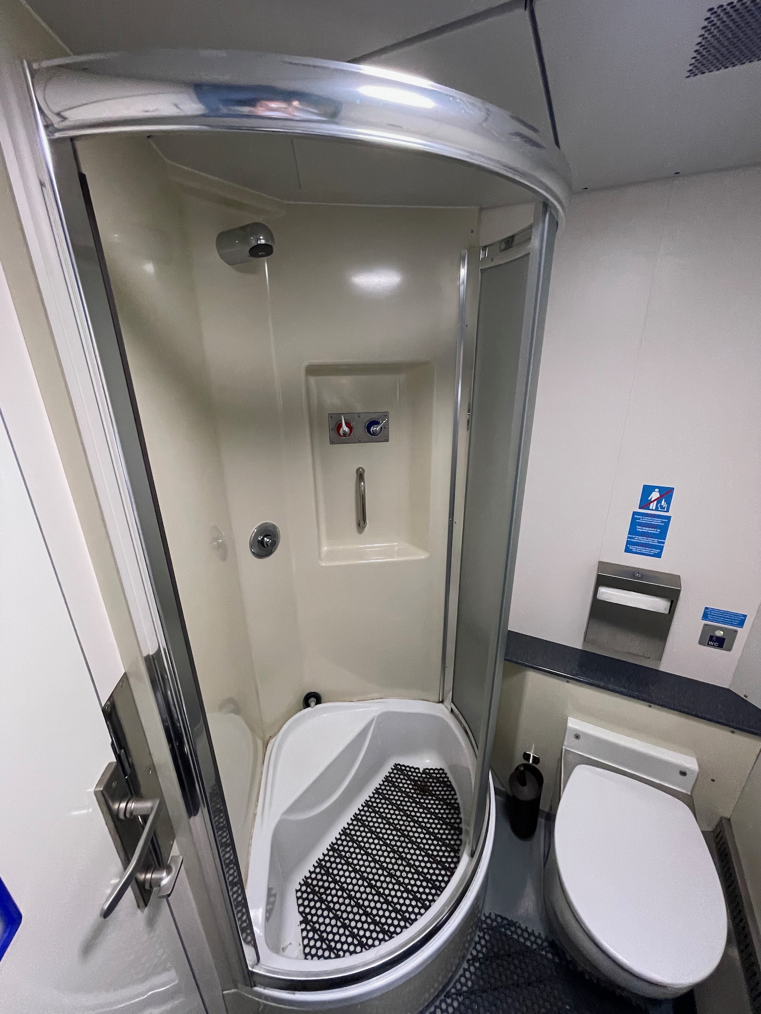 a shower and toilet in a bathroom