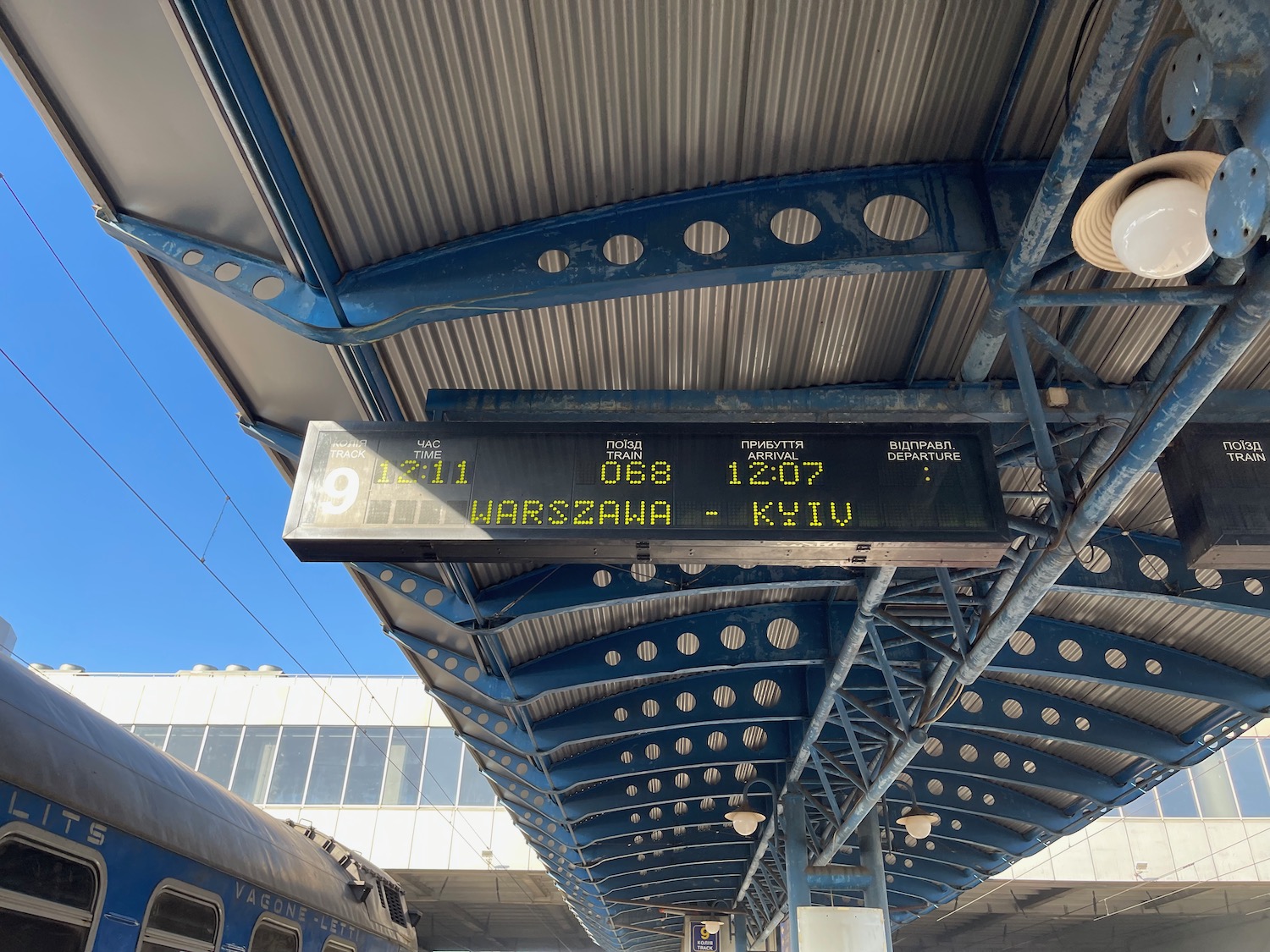 a sign at a train station