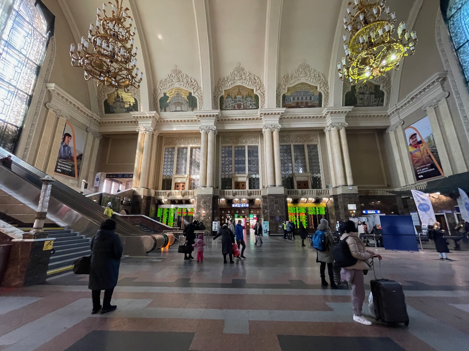 a group of people in a large building