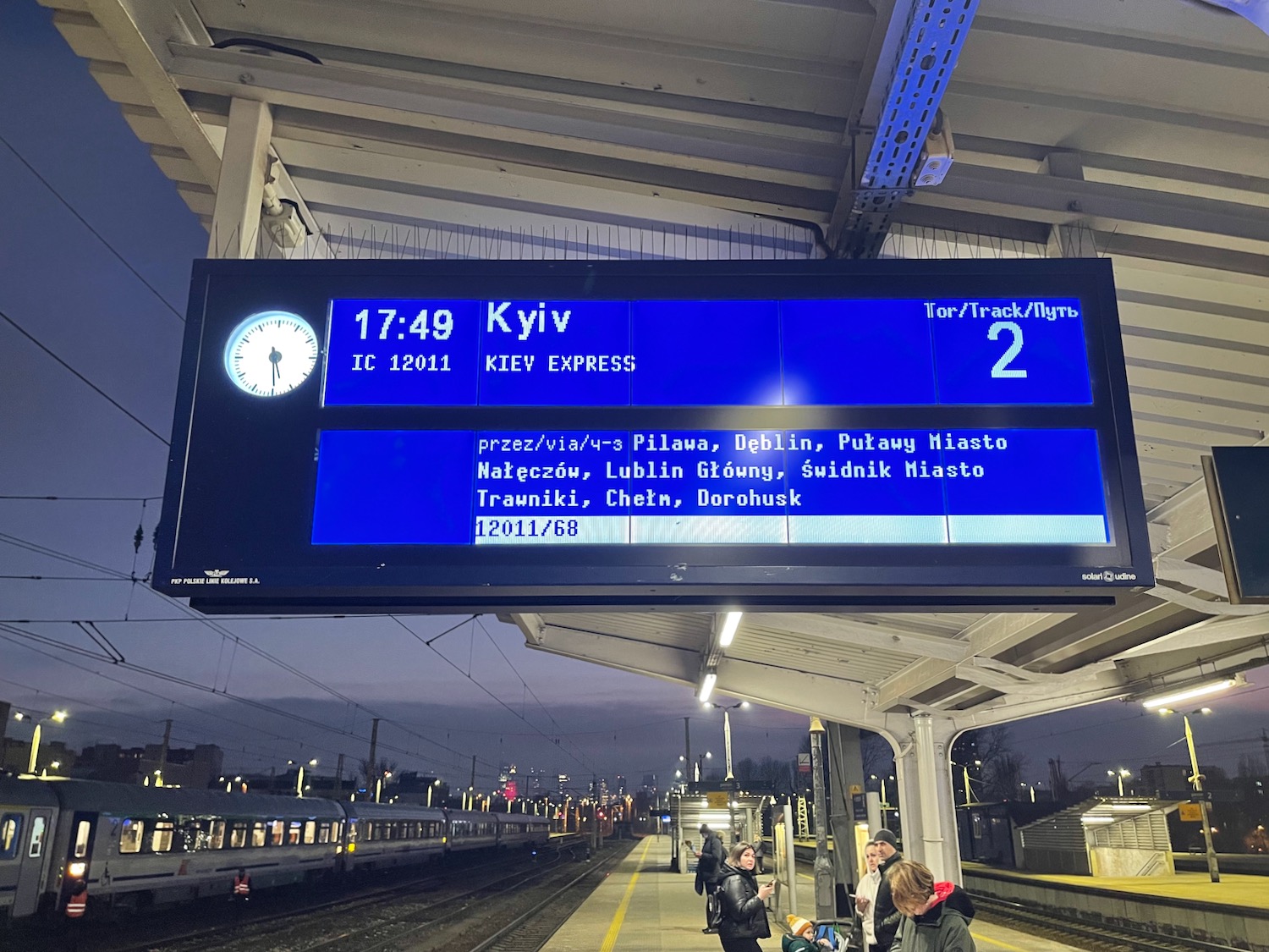 a digital sign at a train station