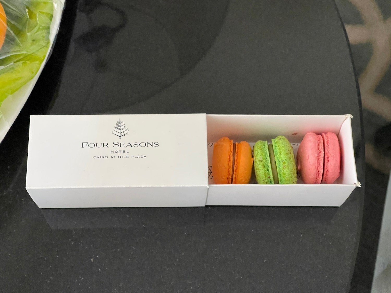 a box of colorful macaroons