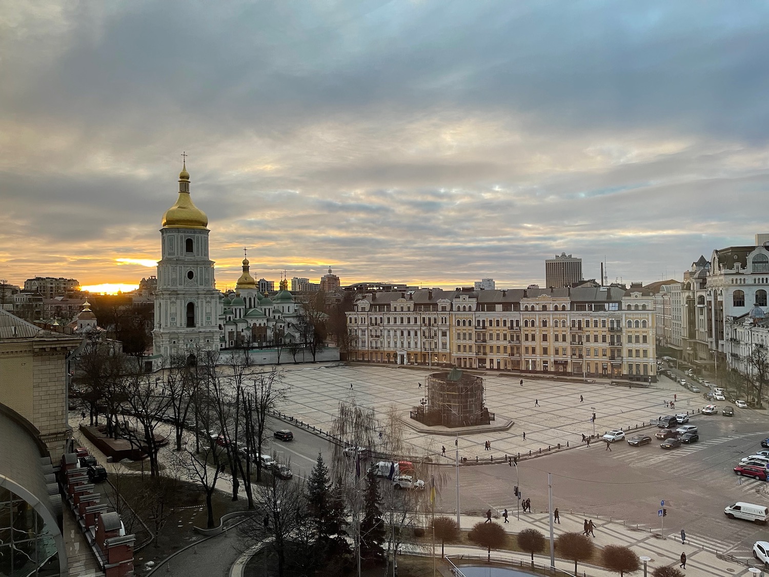 a city with a large square and a clock tower