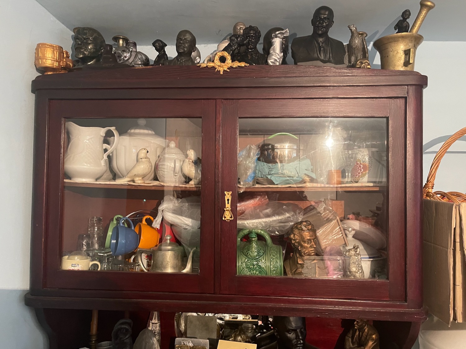 a cabinet with a group of objects on top