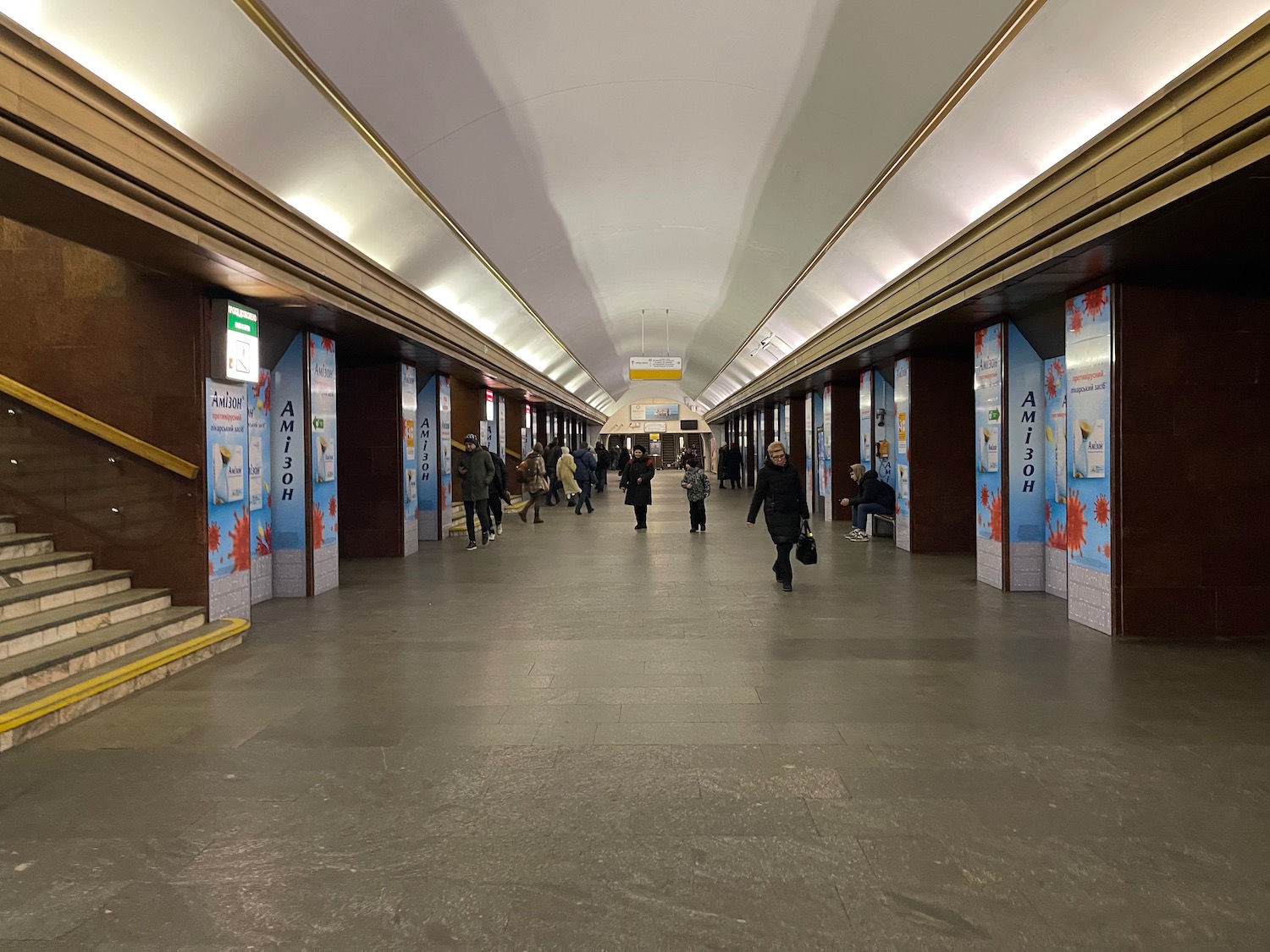 people walking in a tunnel