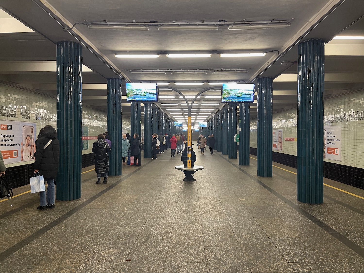 a group of people in a subway station