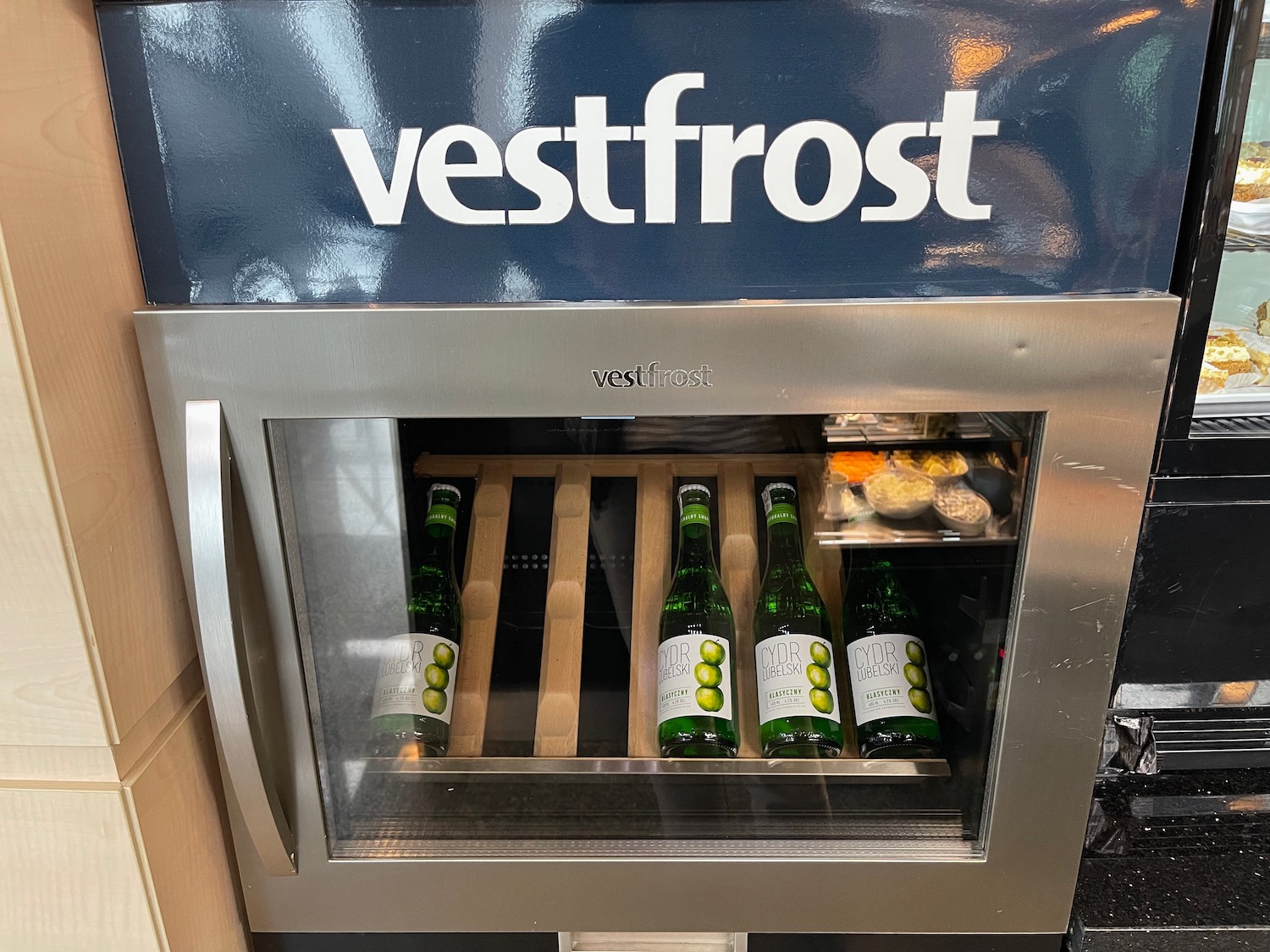 a bottle of wine in a refrigerator