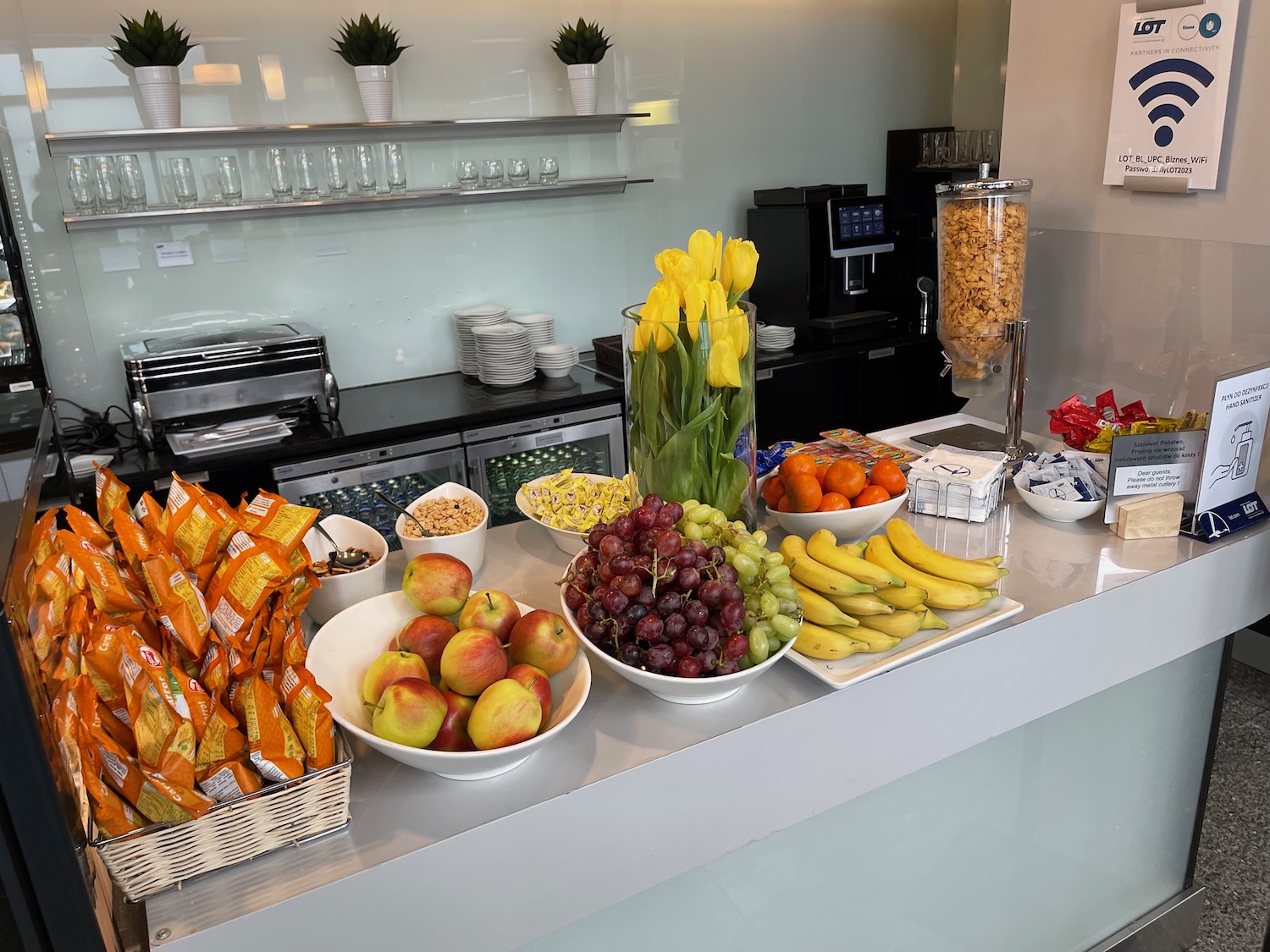 a counter with fruit and snacks