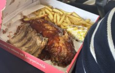 a box of ribs and french fries