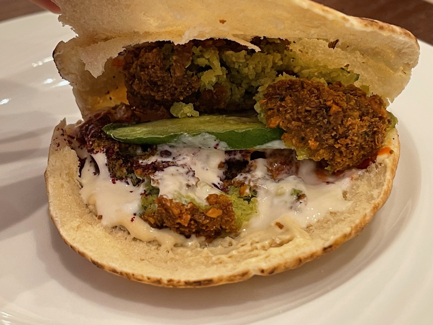 a pita bread with a falafel inside