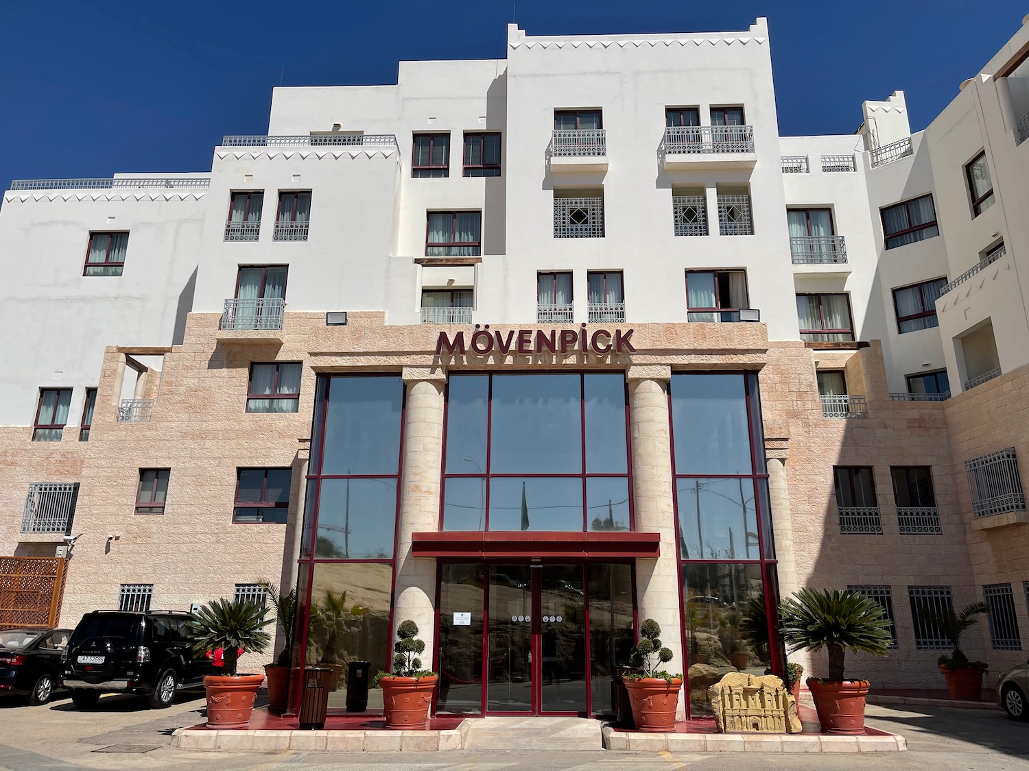 a building with glass doors and windows