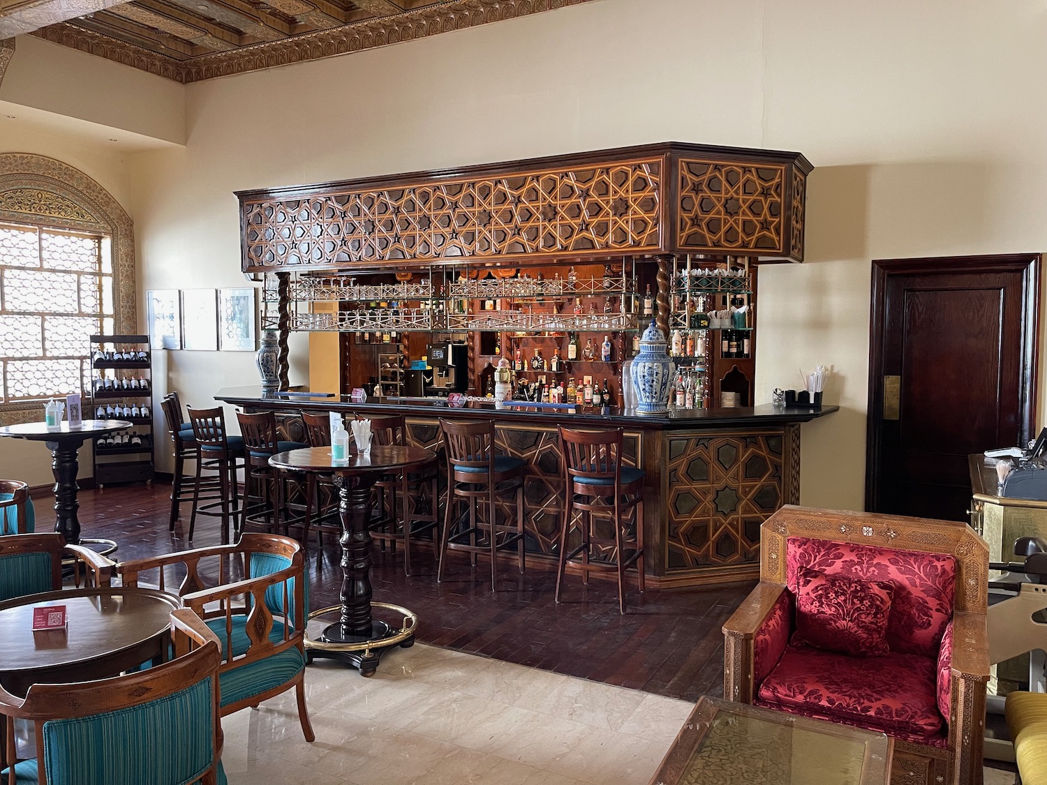 a bar with chairs and tables