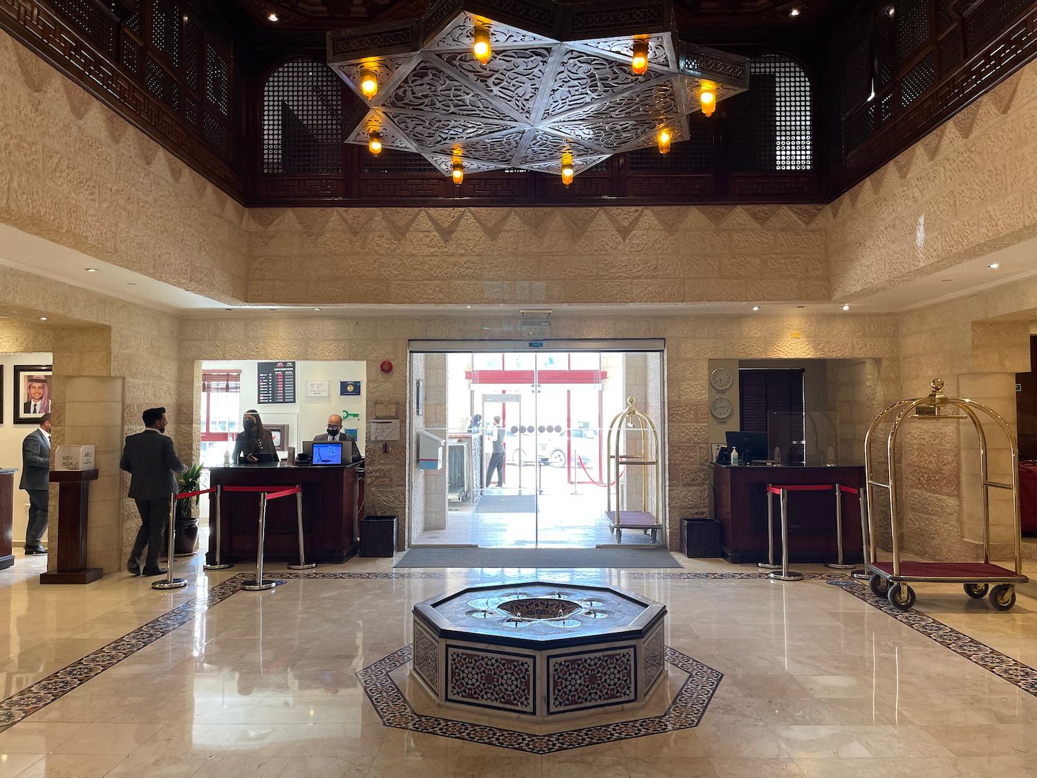 a large room with a large round table and a large chandelier