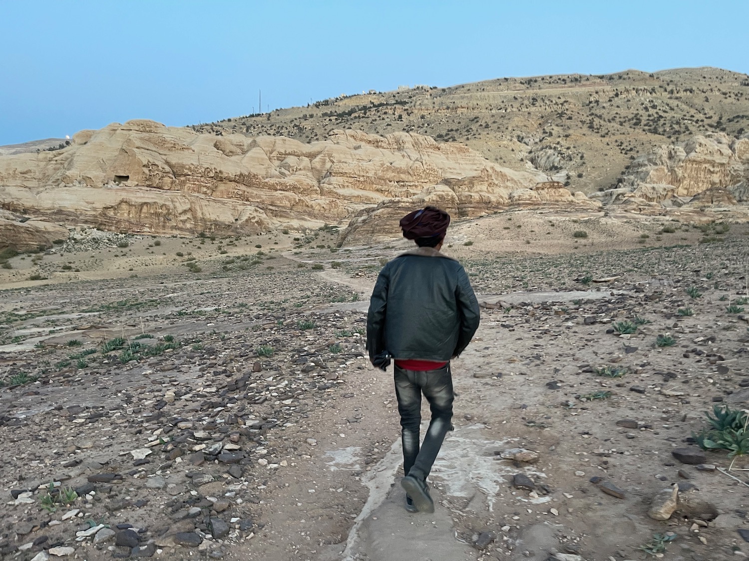 a person walking on a rocky path