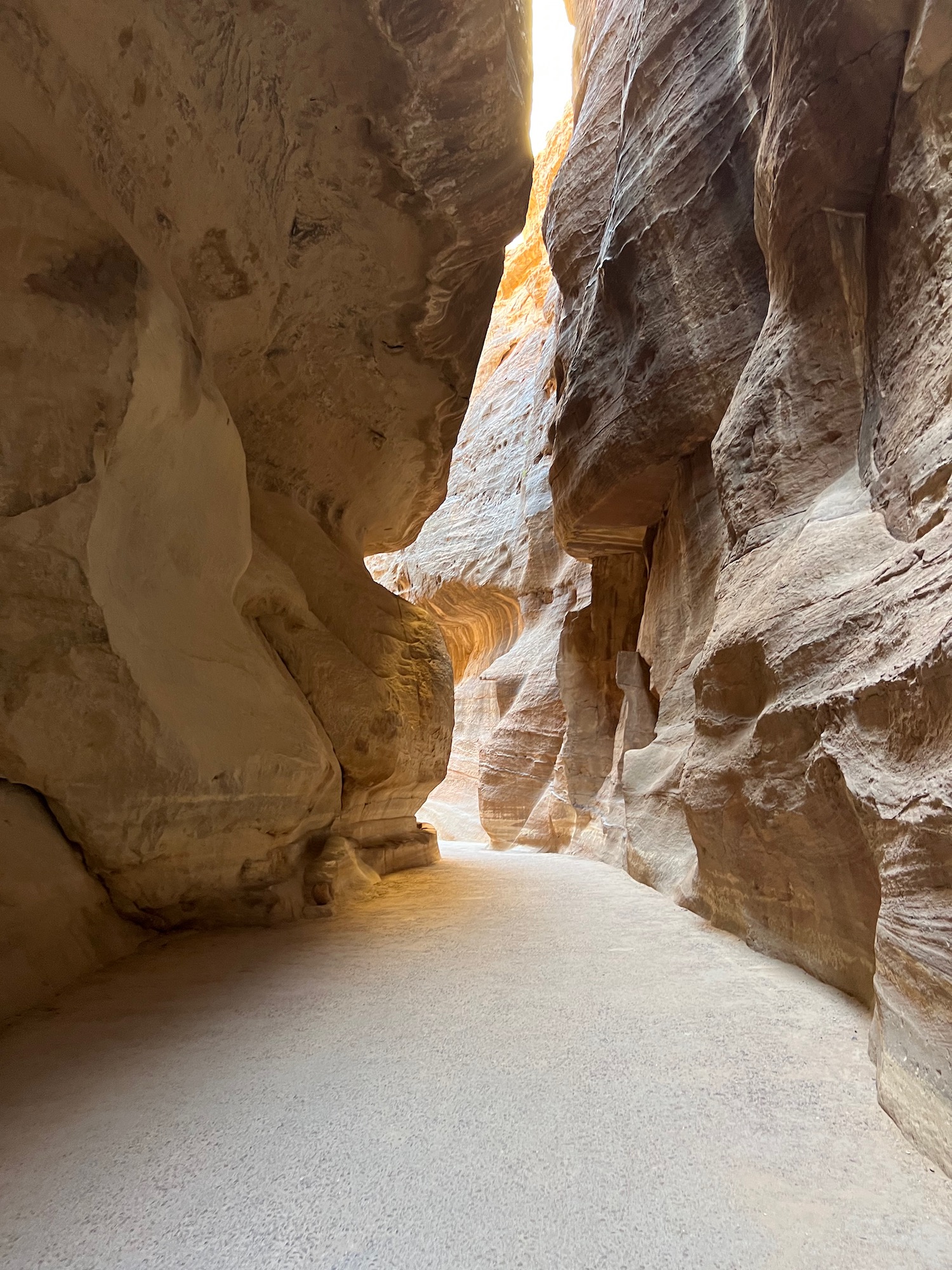 a narrow canyon with large rocks