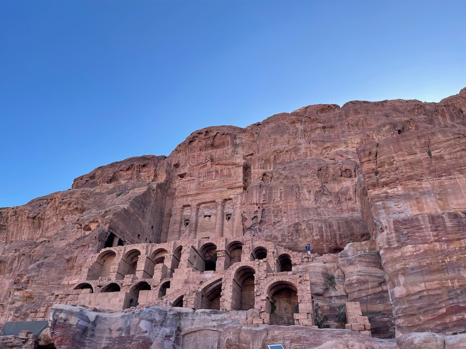 a stone structure on a cliff