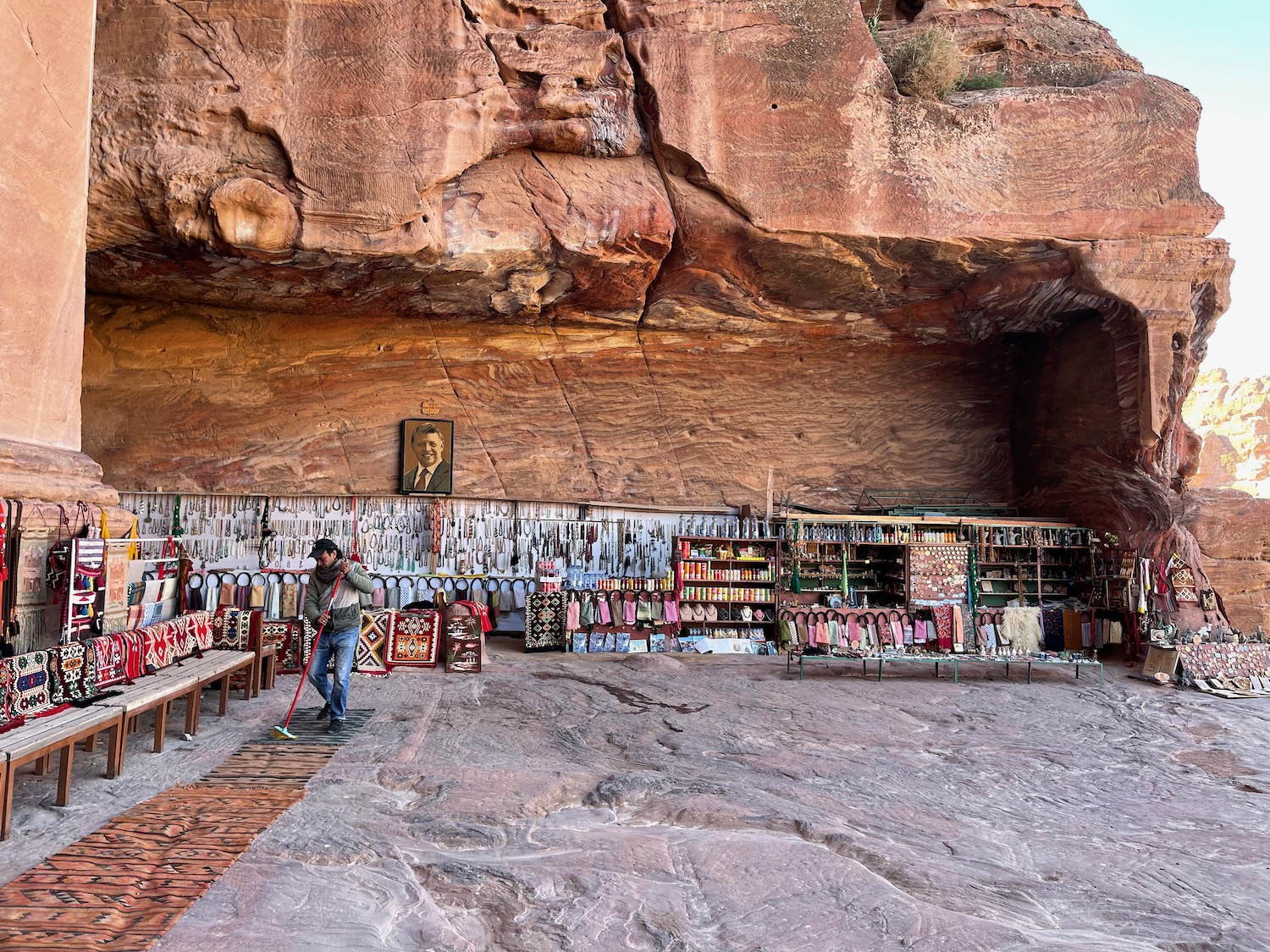 a man standing outside a store