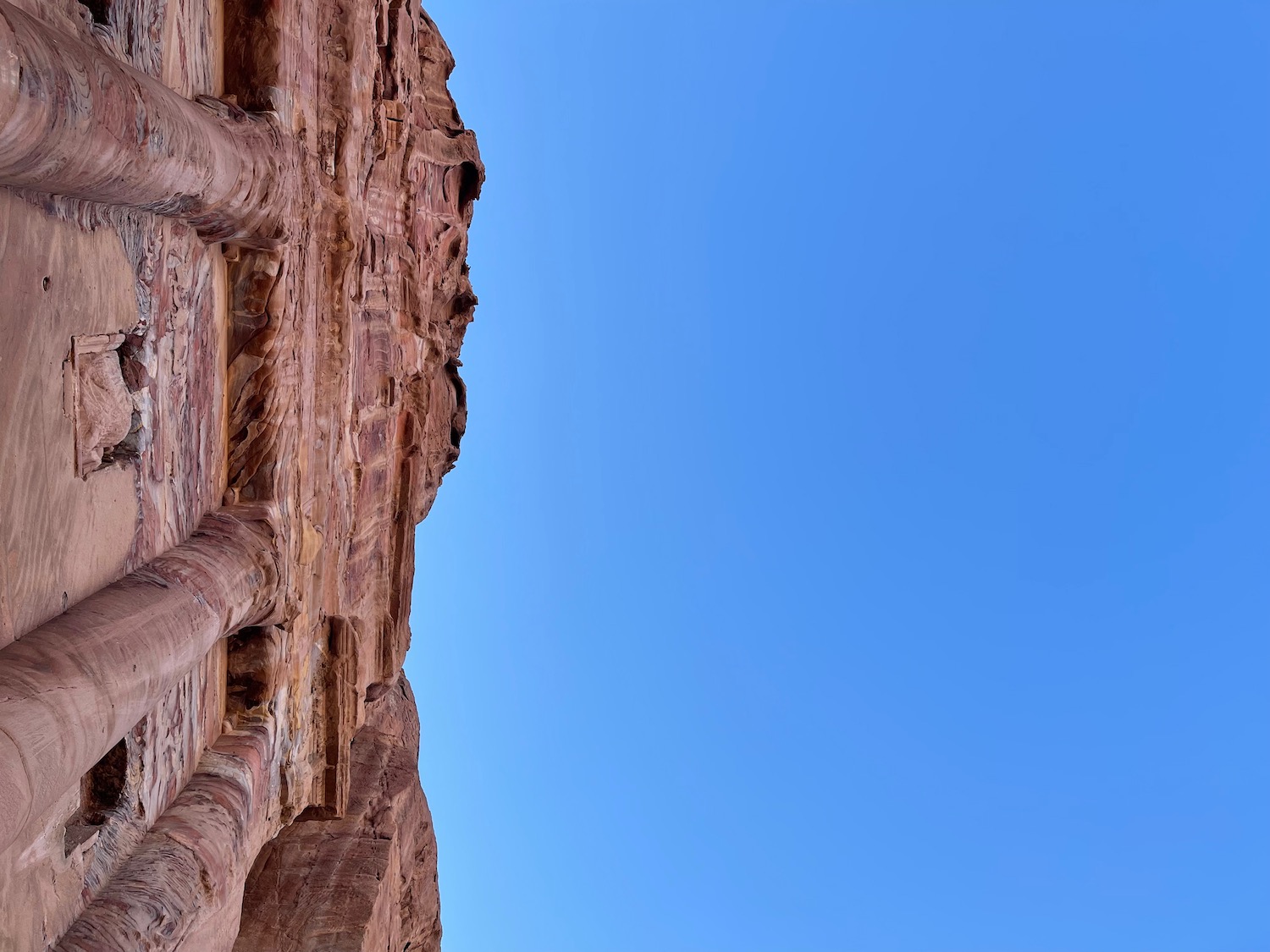 a rock structure with blue sky