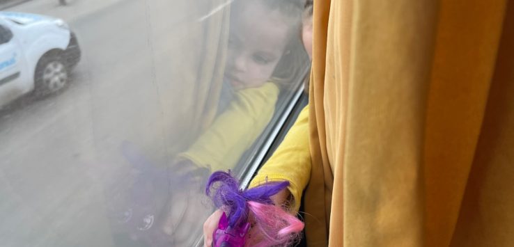 a child looking out a window