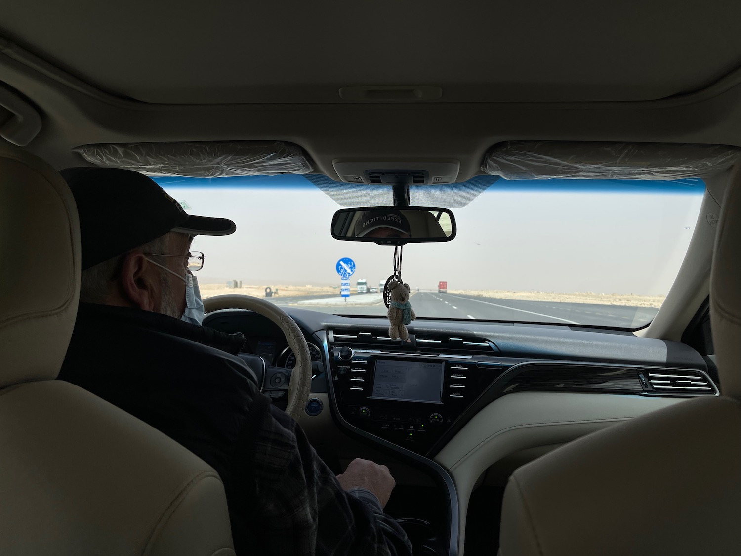 a man driving a car